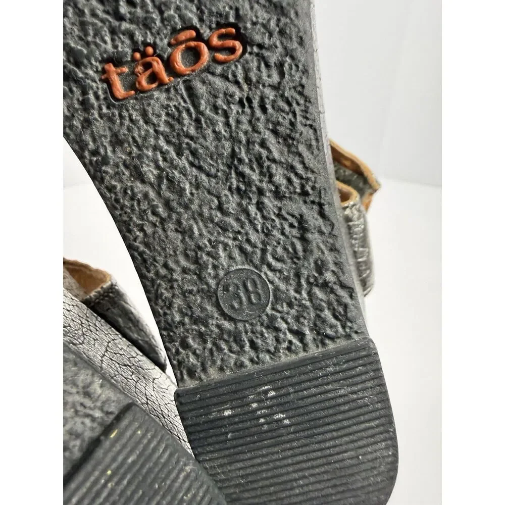 Taos Carousel Sandals 38 /7.5 Silver Crackle Leather Wedge Ankle Strap Medallion